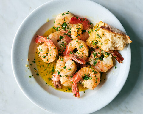 Gambino's Italian Grill signature dishes Veal Gambino (veal medallions with shrimp and mushrooms in a sherry cream sauce), Shrimp Scampi, and Lasagna.